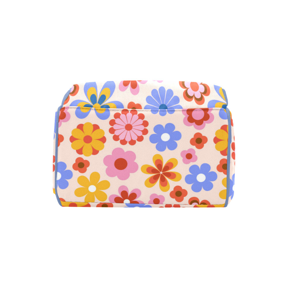 Cute multifunctional backpack with a colorful floral pattern and multiple practical pockets