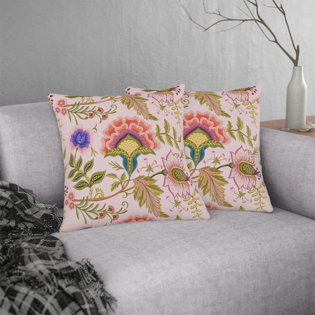 pink floral throw pillow with decorative embroidery