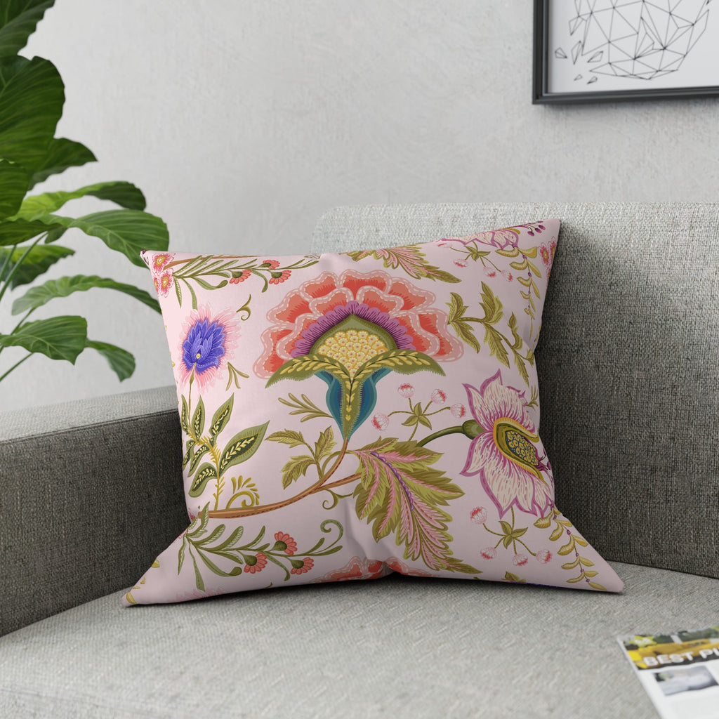 pink floral throw pillow with decorative embroidery